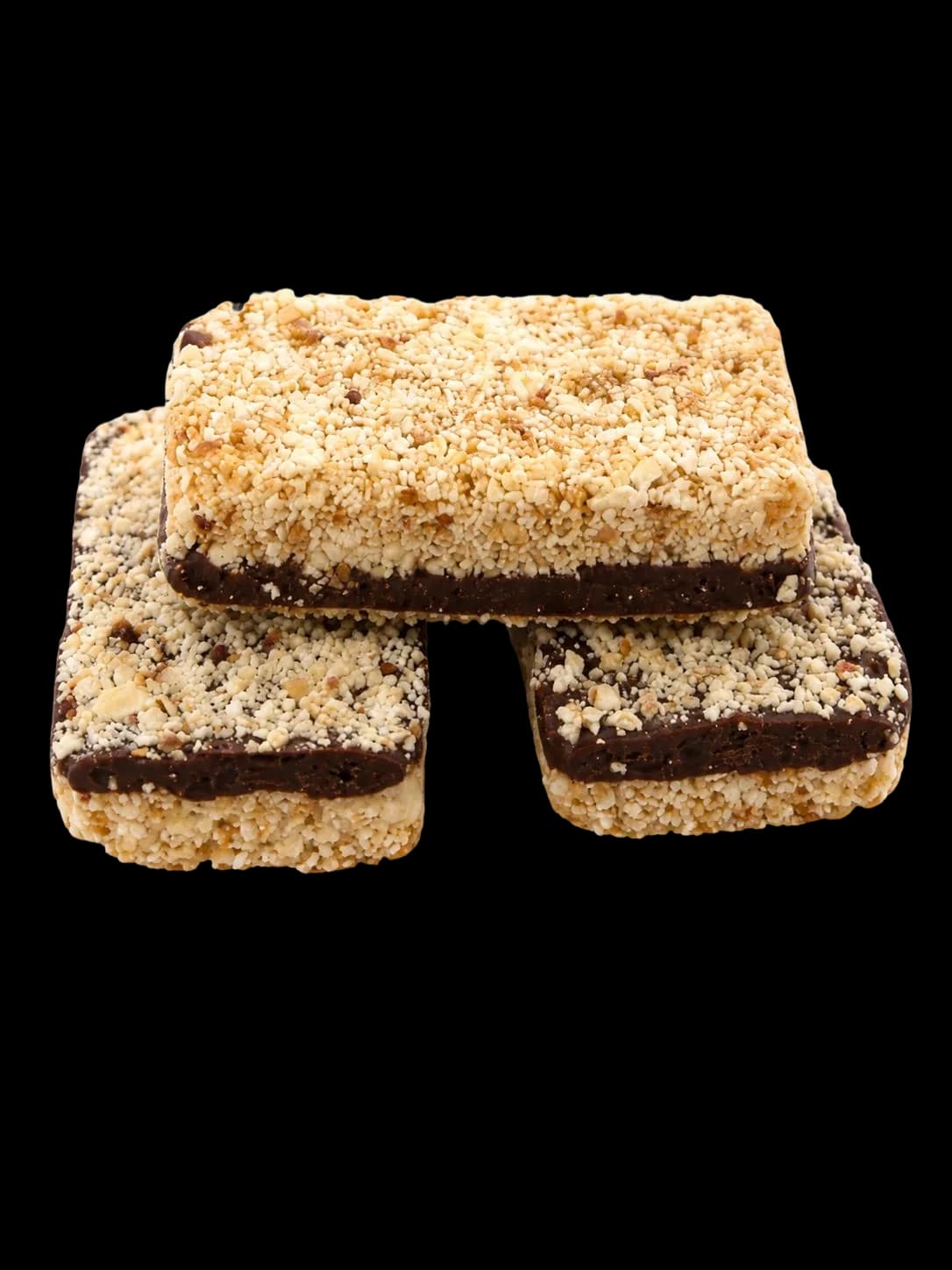 Three Zoomie Crunch bars stacked, showing the chocolate base